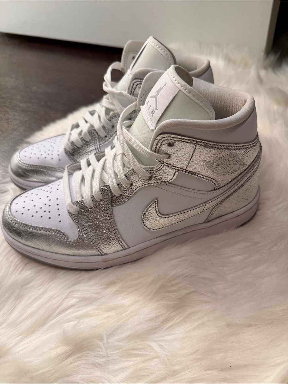 Jordan Women’s Mid-Top Sneakers in White & Silver Metallic